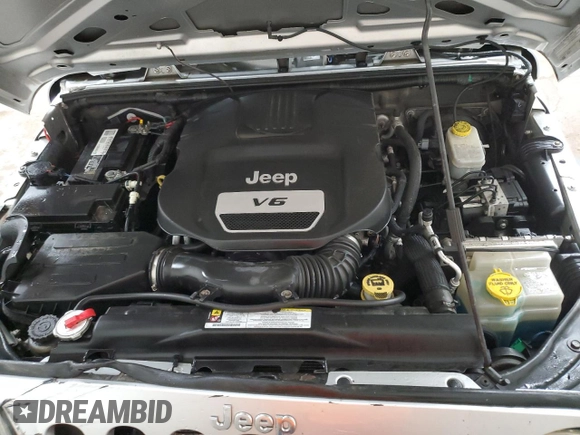 2012 Jeep Wrangler Sport with VIN 1C4AJWAGXCL133013, listed as a Copart auction lot 59788325 with 141,015 mi miles and Clean title. Bid and sale history available at DreamBid. Image 12.