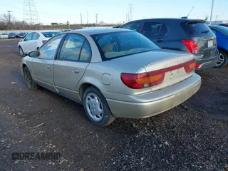 2002 Saturn SL with VIN 1G8ZK52752Z194235, listed as a IAAI auction lot 41792837 with 152,337 mi miles. Bid and sale history available at carsss.com. Image 3.