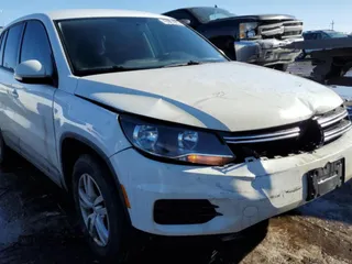 2014 Volkswagen Tiguan SE with VIN WVGAV3AXXEW626089, listed as a Copart auction lot 43056995 with 140,070 mi miles and Salvage title. Bid and sale history available at DreamBid. Image 4.