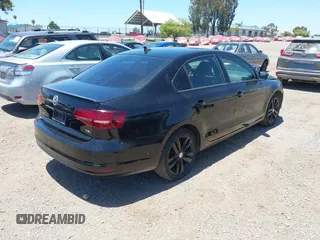 2018 Volkswagen Jetta SE Sport with VIN 3VWD17AJ2JM255162, listed as a IAAI auction lot 42506390 with 111,186 mi miles and . Bid and sale history available at DreamBid. Image 4.