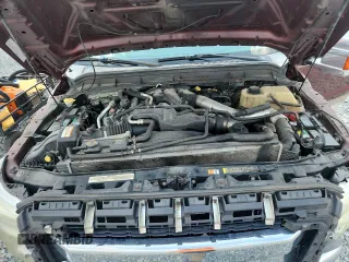 2012 Ford F-250 XL z VIN 1FT7W2BT0CEB77042, wystawiony jako Copart lot #57882195 z przebiegiem 141 574 mil mil oraz Szkoda całkowita • Salvage title. Historia ofert i sprzedaży dostępna na DreamBid. Obrazek 11.