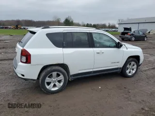2014 Jeep Compass Sport with VIN 1C4NJDBB9ED641754, listed as a Copart auction lot 52806165 with 76,100 mi miles and Clean Title. Bid and sale history available at carsss.com. Image 3.