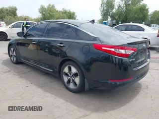 2013 Kia Optima Hybrid EX with VIN KNAGM4AD3D5057701, listed as a IAAI auction lot 42111647 with 160,426 mi miles. Bid and sale history available at carsss.com. Image 3.