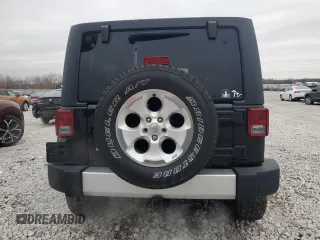 2015 Jeep Wrangler Unlimited Sahara with VIN 1C4BJWEGXFL606573, listed as a Copart auction lot 83983894 with 103,314 mi miles and Clean title. Bid and sale history available at DreamBid. Image 6.