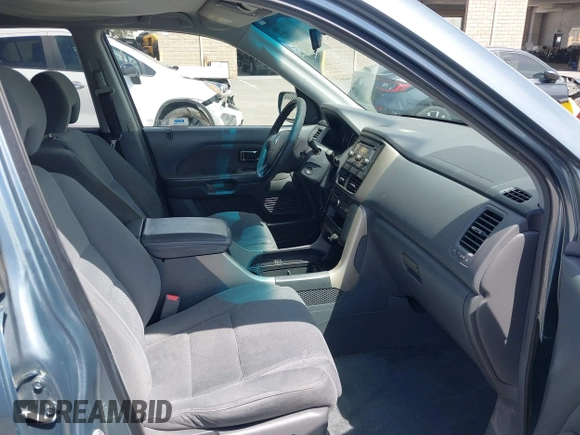 2007 Honda Pilot EX with VIN 2HKYF18447H520522, listed as a IAAI auction lot 42018937 with 128,401 mi miles. Bid and sale history available at carsss.com. Image 5.