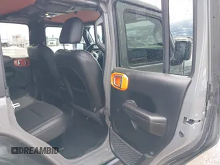 2021 Jeep Wrangler Unlimited Willys with VIN 1C4HJXDN6MW664417, listed as a IAAI auction lot 41598605 with 37,963 mi miles and . Bid and sale history available at DreamBid. Image 8.