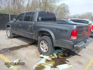 2002 Dodge Dakota Sport with VIN 1B7HG38N92S663249, listed as a IAAI auction lot 41912626 with 240,019 mi miles. Bid and sale history available at carsss.com. Image 3.