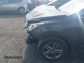 2017 Hyundai Santa Fe 2.4L с VIN 5XYZTDLB2HG451648, выставлен на аукционе IAAI как лот 42380301 с пробегом 156 687 миль миль и . История ставок и продаж доступна на DreamBid. Изображение 6.