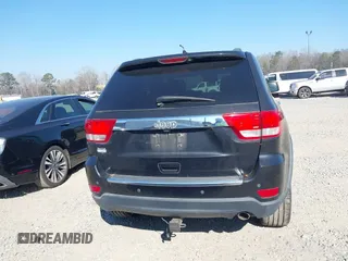 2013 Jeep Grand Cherokee Overland with VIN 1C4RJECG7DC644822, listed as a IAAI auction lot 41658872 with 156,838 mi miles. Bid and sale history available at carsss.com. Image 16.