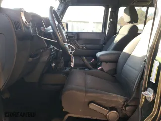 2011 Jeep Wrangler Unlimited Sahara with VIN 1J4BA5H15BL635016, listed as a Copart auction lot 84433444 with 124,217 mi miles and Salvage Title. Bid and sale history available at carsss.com. Image 7.