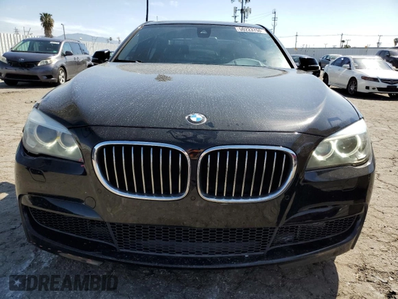 2015 BMW 7 Series 740i с VIN WBAYA6C58FD827009, выставлен на аукционе Copart как лот 50223755 с пробегом 105 440 миль миль и Списание • Salvage title. История ставок и продаж доступна на DreamBid. Изображение 5.