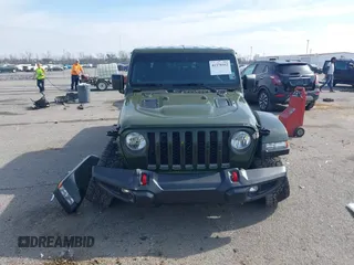 2023 Jeep Gladiator Rubicon with VIN 1C6JJTBGXPL586154, listed as a IAAI auction lot 41370352 with 11,207 mi miles and . Bid and sale history available at DreamBid. Image 12.