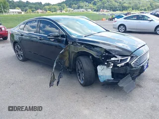 2017 Ford Fusion Titanium z VIN 3FA6P0D92HR106692, wystawiony jako IAAI lot #40135693 z przebiegiem 81 735 mil mil oraz . Historia ofert i sprzedaży dostępna na DreamBid. Obrazek 1.