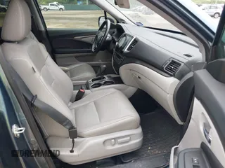 2017 Honda Pilot EX-L with VIN 5FNYF5H88HB042003, listed as a IAAI auction lot 42296542 with 172,823 mi miles and . Bid and sale history available at DreamBid. Image 5.