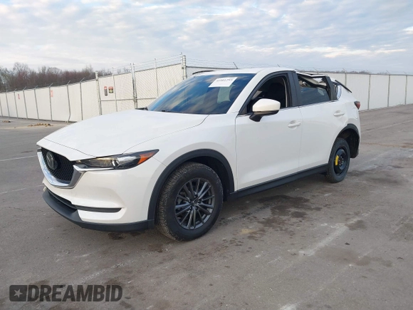 2019 Mazda CX-5 Sport with VIN JM3KFABMXK1655302, listed as a IAAI auction lot 41901293 with 140,369 mi miles and . Bid and sale history available at DreamBid. Image 2.