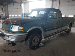 1998 Ford F-150 z VIN 1FTZX18W0WNB10429, wystawiony jako IAAI lot #42501385 z przebiegiem 175 318 mil mil oraz . Historia ofert i sprzedaży dostępna na DreamBid. Obrazek 17.