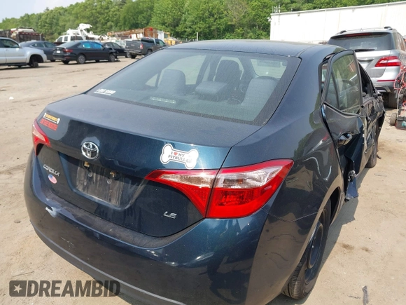 2018 Toyota Corolla L with VIN 2T1BURHE1JC052651, listed as a IAAI auction lot 42430958 with 104,664 mi miles and . Bid and sale history available at DreamBid. Image 4.