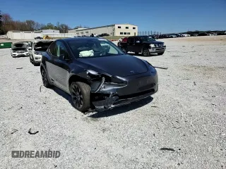 2025 Tesla Model Y Long Range with VIN 7SAYGAEEXSF253326, listed as a Copart auction lot 49527965 with 5,803 mi miles and Salvage Title. Bid and sale history available at DreamBid. Image 11.
