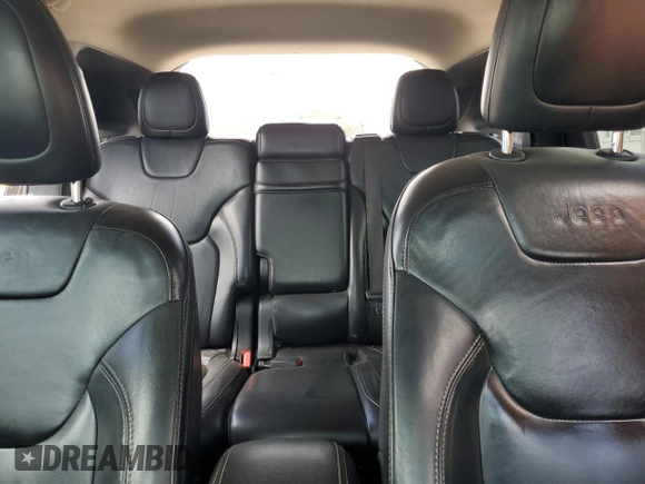 2016 Jeep Cherokee Limited with VIN 1C4PJLDB0GW287372, listed as a Copart auction lot 52795535 with 173,038 mi miles and Salvage title. Bid and sale history available at DreamBid. Image 10.
