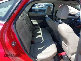 2012 Ford Focus SEL with VIN 1FAHP3H23CL291253, listed as a IAAI auction lot 42044902 with 184,716 mi miles. Bid and sale history available at carsss.com. Image 8.