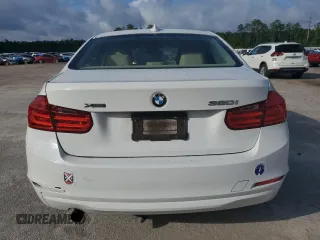 2014 BMW 3 Series 320i xDrive with VIN WBA3C3G52ENS67719, listed as a Copart auction lot 56863505 with 90,490 mi miles and Salvage title. Bid and sale history available at DreamBid. Image 6.
