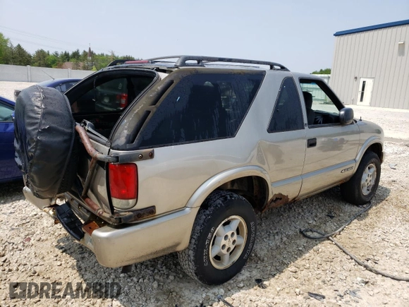 2000 Chevrolet Blazer LS z VIN 1GNCT18W3YK175871, wystawiony jako Copart lot #58230204 z przebiegiem Nie podano mil oraz Nie do naprawy • Non repairable. Historia ofert i sprzedaży dostępna na DreamBid. Obrazek 3.