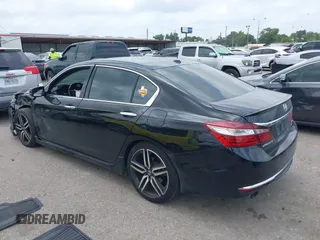 2016 Honda Accord Touring with VIN 1HGCR3F94GA004410, listed as a IAAI auction lot 42288402 with 139,068 mi miles and . Bid and sale history available at DreamBid. Image 3.