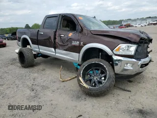 2014 Ram 2500 Laramie with VIN 3C6UR5FLXEG179678, listed as a Copart auction lot 53388095 with 128,112 mi miles and Salvage title. Bid and sale history available at DreamBid. Image 4.