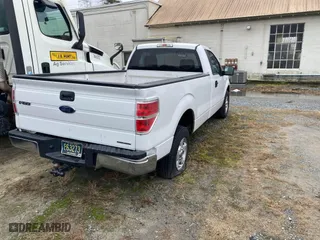 2014 Ford F-150 XL with VIN 1FTNF1CF7EKE17816, listed as a IAAI auction lot 41527762 with 196,338 mi miles. Bid and sale history available at carsss.com. Image 4.