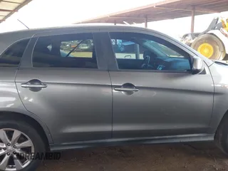2015 Mitsubishi Outlander ES z VIN 4A4AP3AU7FE042477, wystawiony jako IAAI lot #42243771 z przebiegiem 114 331 mil mil oraz . Historia ofert i sprzedaży dostępna na DreamBid. Obrazek 13.