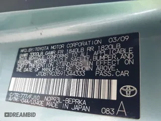 2009 Toyota Yaris with VIN JTDBT903591344333, listed as a IAAI auction lot 41296702 with 166,979 mi miles. Bid and sale history available at carsss.com. Image 9.