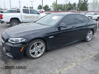 2015 BMW 5 Series 535i with VIN WBA5B1C55FG128387, listed as a IAAI auction lot 41885806 with 94,734 mi miles and . Bid and sale history available at carsss.com. Image 2.
