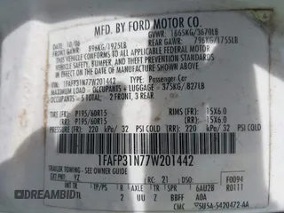 2007 Ford Focus S with VIN 1FAFP31N77W201442, listed as a IAAI auction lot 41887827 with 137,001 mi miles and . Bid and sale history available at carsss.com. Image 9.