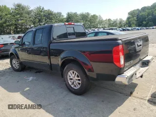 2014 Nissan Frontier SV with VIN 1N6AD0FV7EN736839, listed as a Copart auction lot 58390995 with 111,403 mi miles and Salvage title. Bid and sale history available at DreamBid. Image 2.