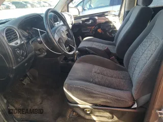 2005 GMC Envoy SLT with VIN 1GKDS13SX52322725, listed as a Copart auction lot 82032674 with 249,288 mi miles and Salvage Title. Bid and sale history available at carsss.com. Image 7.