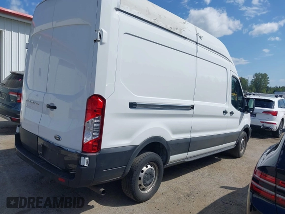 2023 Ford Transit Cargo with VIN 1FTBR1X84PKB02027, listed as a IAAI auction lot 42062820 with 79,813 mi miles and . Bid and sale history available at DreamBid. Image 4.