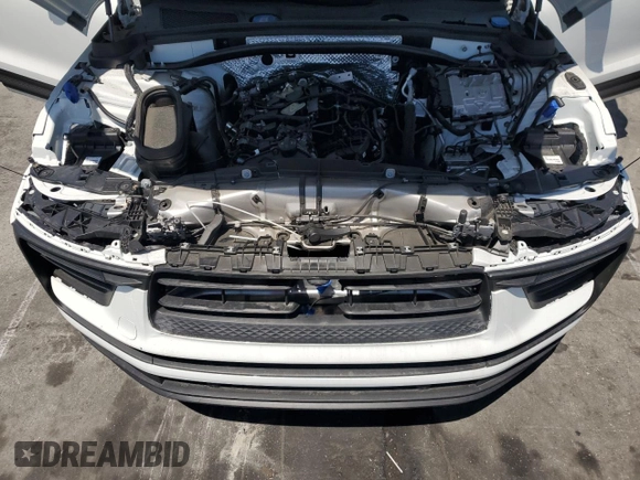 2025 Porsche Macan z VIN WP1AA2A58SLB01343, wystawiony jako Copart lot #54007455 z przebiegiem 1 415 mil mil oraz Szkoda całkowita • Salvage title. Historia ofert i sprzedaży dostępna na DreamBid. Obrazek 12.