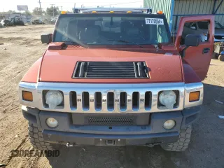 2003 Hummer H2 with VIN 5GRGN23U33H125797, listed as a Copart auction lot 77170554 with 166,739 mi miles and Clean Title. Bid and sale history available at carsss.com. Image 12.