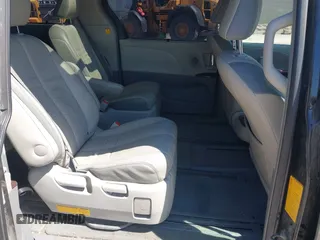 2011 Toyota Sienna XLE with VIN 5TDDK3DC8BS011975, listed as a IAAI auction lot 42112522 with 124,251 mi miles. Bid and sale history available at carsss.com. Image 8.