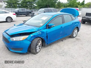 2015 Ford Focus SE z VIN 1FADP3F26FL252212, wystawiony jako IAAI lot #42345763 z przebiegiem 102 549 mil mil oraz . Historia ofert i sprzedaży dostępna na DreamBid. Obrazek 17.