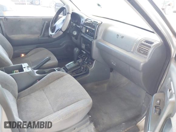 1999 Isuzu Rodeo S with VIN 4S2CM58W9X4354789, listed as a IAAI auction lot 42444956 with Not provided miles and . Bid and sale history available at DreamBid. Image 5.