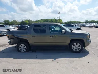 2007 Honda Ridgeline RTL w/Leather with VIN 2HJYK16527H547522, listed as a IAAI auction lot 41939603 with 127,899 mi miles. Bid and sale history available at carsss.com. Image 13.