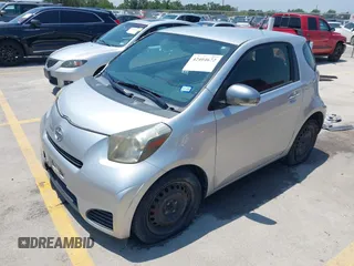 2012 Scion iQ with VIN JTNJJXB07CJ018562, listed as a IAAI auction lot 42404672 with 79,867 mi miles and . Bid and sale history available at DreamBid. Image 2.