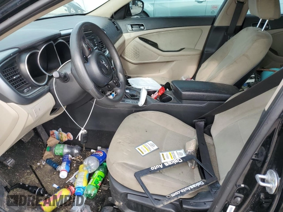 2014 Kia Optima LX z VIN 5XXGM4A79EG331820, wystawiony jako Copart lot #55628945 z przebiegiem Nie podano mil oraz Szkoda całkowita • Salvage title. Historia ofert i sprzedaży dostępna na DreamBid. Obrazek 7.