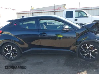 2018 Toyota C-HR XLE z VIN JTNKHMBX7J1004430, wystawiony jako IAAI lot #41780739 z przebiegiem 148 882 mil mil oraz . Historia ofert i sprzedaży dostępna na DreamBid. Obrazek 14.