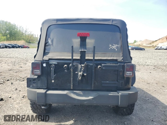 2015 Jeep Wrangler Unlimited Freedom с VIN 1C4BJWDG1FL609850, выставлен на аукционе Copart как лот 55169065 с пробегом 97 415 миль миль и Чистый • Clean title. История ставок и продаж доступна на DreamBid. Изображение 6.