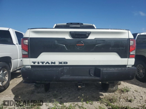 2021 Nissan Titan SV z VIN 1N6AA1FB2MN514566, wystawiony jako Copart lot #75194294 z przebiegiem 34 987 mil mil oraz Nie do naprawy • Non repairable. Historia ofert i sprzedaży dostępna na DreamBid. Obrazek 6.