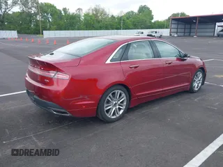 2015 Lincoln MKZ Hybrid with VIN 3LN6L2LU3FR602438, listed as a IAAI auction lot 42130400 with 115,317 mi miles. Bid and sale history available at carsss.com. Image 4.
