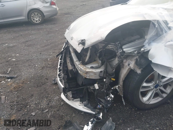 2018 Ford Fusion SE z VIN 3FA6P0HD2JR207865, wystawiony jako IAAI lot #41835895 z przebiegiem 91 069 mil mil oraz . Historia ofert i sprzedaży dostępna na DreamBid. Obrazek 6.