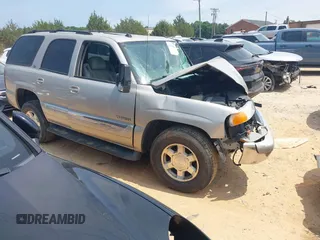 2005 GMC Yukon SLT z VIN 1GKEK13T75R215541, wystawiony jako IAAI lot #42267981 z przebiegiem Nie podano mil oraz . Historia ofert i sprzedaży dostępna na DreamBid. Obrazek 1.